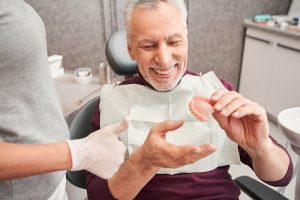 older man getting his dentures