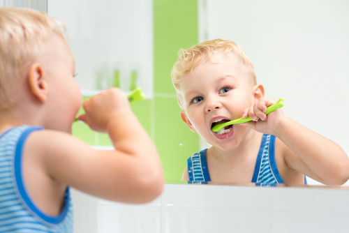 Boy Brushing his teeth